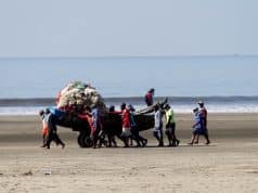 Pulling Boats Barefoot Across the Sand: The Daily Struggle of Fishermen on the Cox’s Bazar Coast