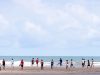 Youths Enliven Sonar Para Beach Mornings With Football and Cricket