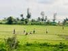 Youths Enjoy Cricket Amid Drizzle and Overcast Skies in Dariya Nagar